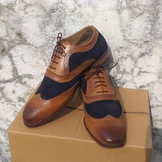 A refined look with Brogue Oxfords. 