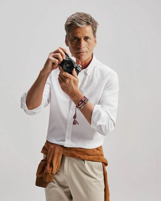 A refined appearance with button-down and chinos. 