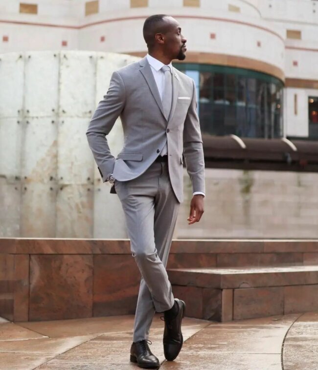 A stylish look with a grey suit. 