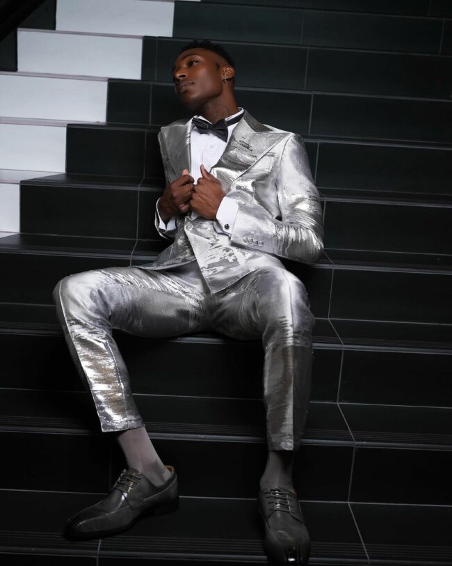 A refined look with a metallic silver suit. 