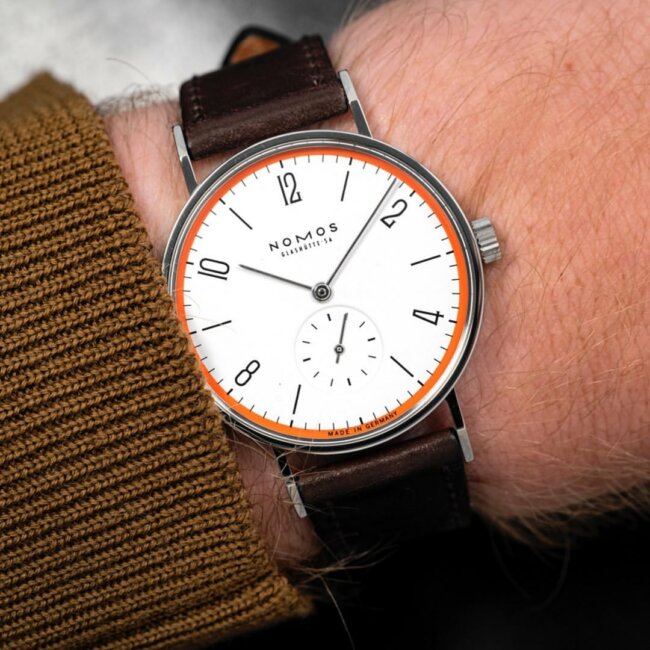 A minimal look with a Nomos Tangente watch. 