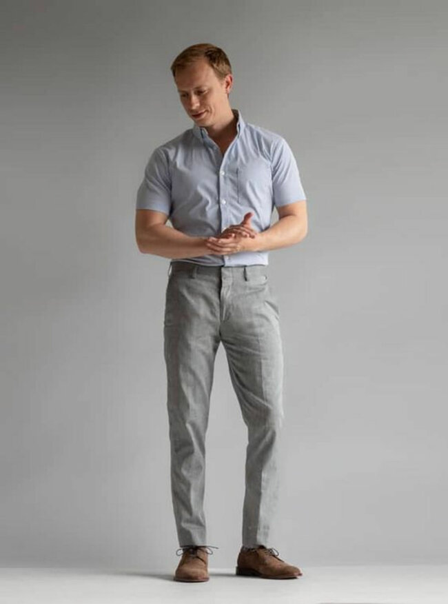 A relaxed yet refined look featuring short sleeve shirt and dress pants. 