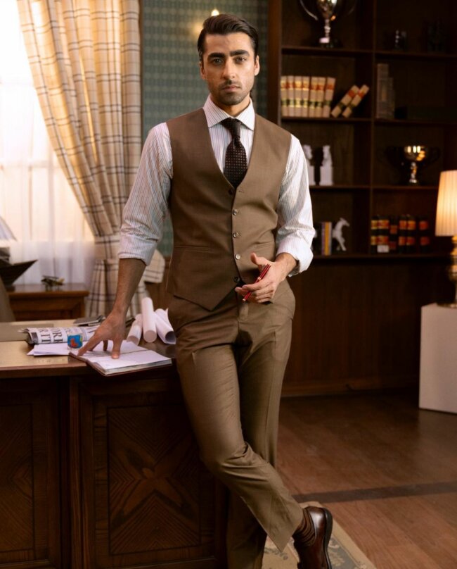 A smart look with a vest and trousers. 