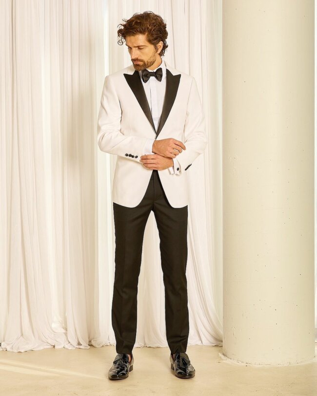A cool and classy look with a white dinner jacket. 