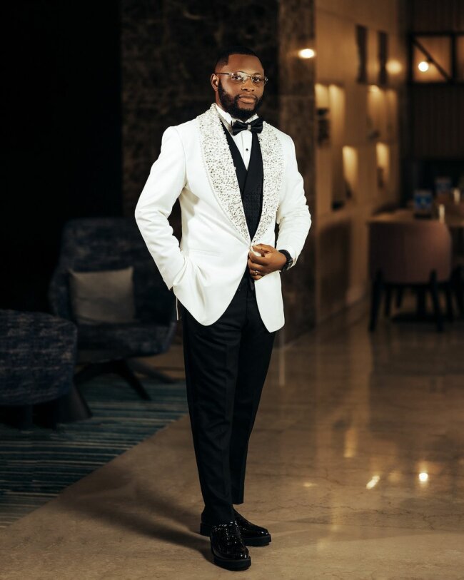 A classy look with a white dinner jacket. 