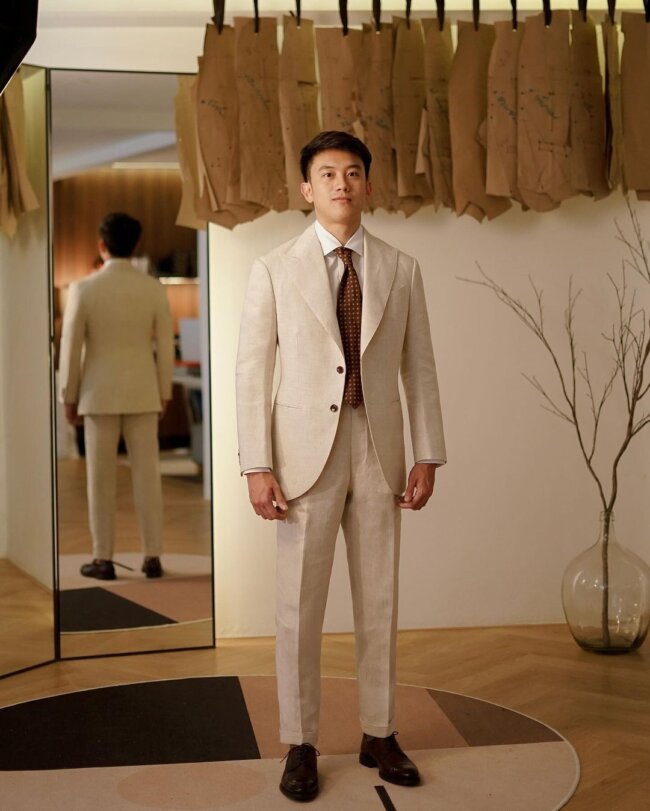 A polished look with a beige suit.