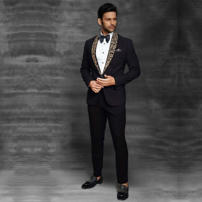 A refined look with a black tuxedo. 