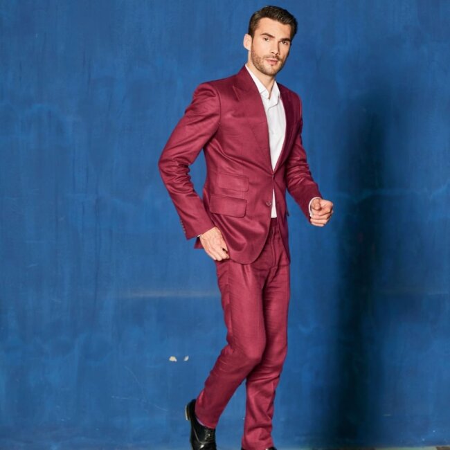 A bold look with bright-colored suit.