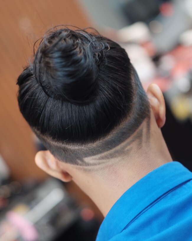 A bold look with bun and design. 