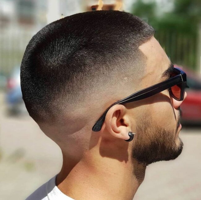 A polished look with buzz cut and skin fade. 