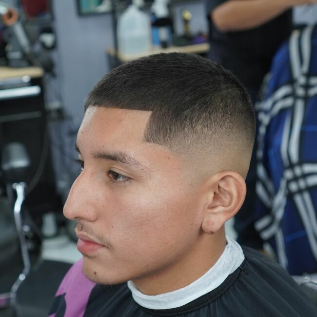 A cool look with buzz cut and line up.