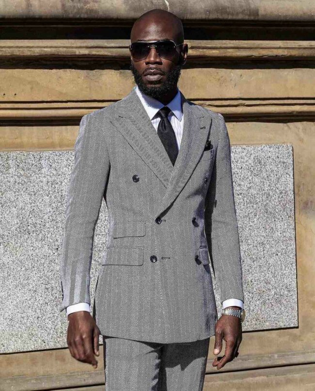 A smart look with herringbone suit.