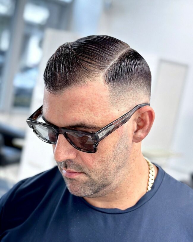 A cool look with high and tight hairstyle. 