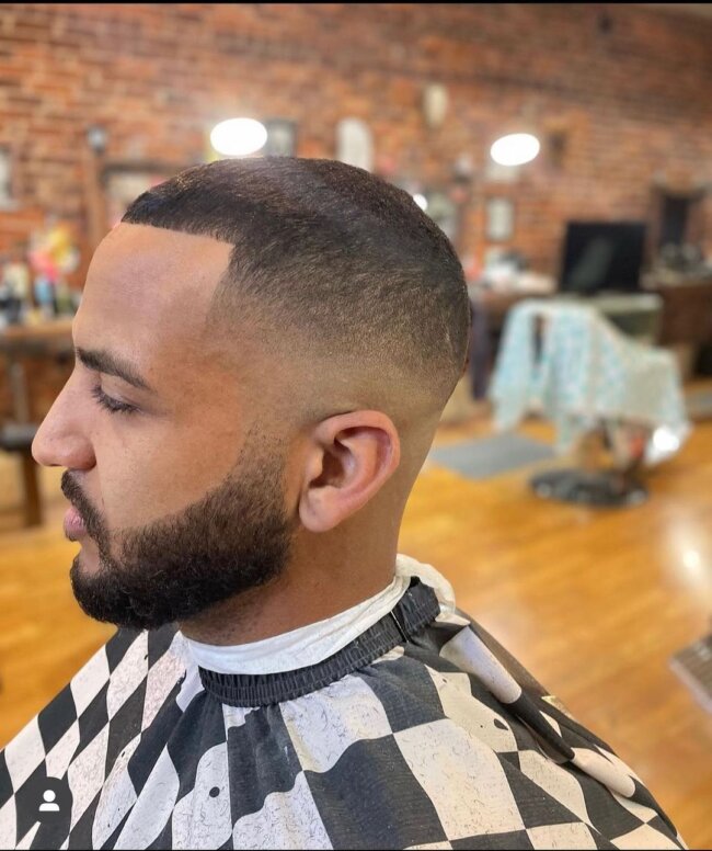 A defined look with line up buzz cut. 