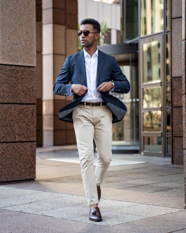 A classic look with a navy blazer and chinos. 