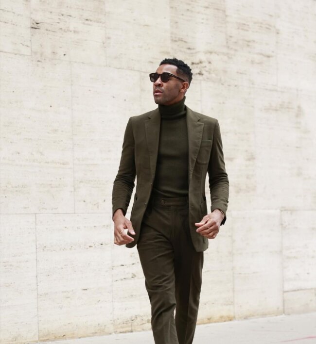A cool look with an olive green suit. 