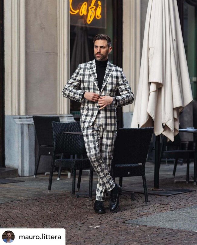 A cool look with a patterned suit. 