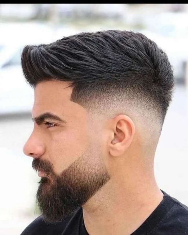 A classy look with quiff and beard.