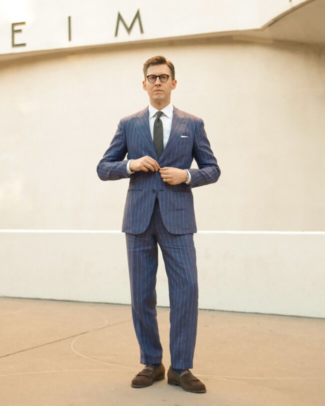 A bold look with a striped linen suit.