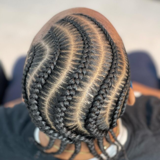 A refined look with wavy cornrows. 