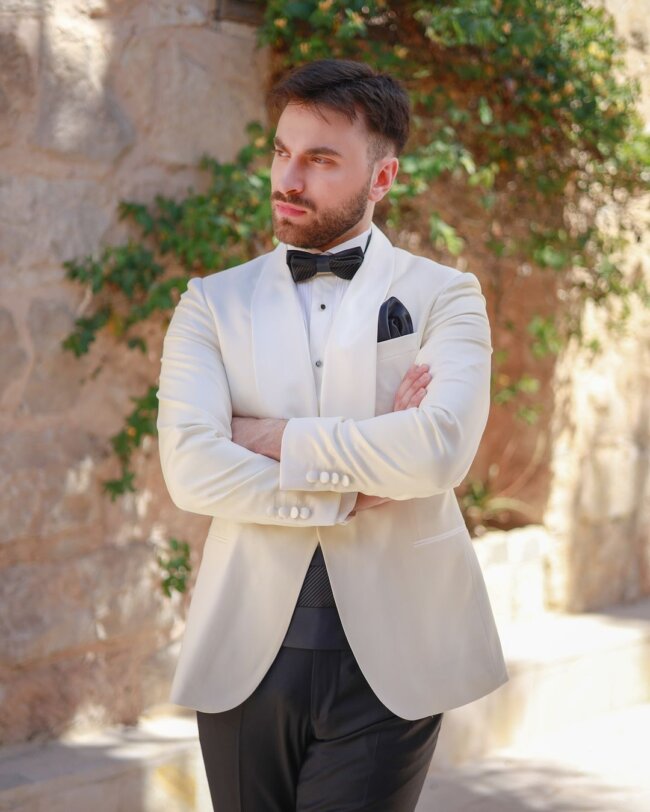 A polished look with a white tuxedo. 
