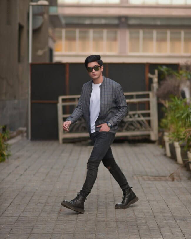 A bold look with a bomber jacket and slim-fit pants. 